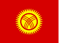 Die Kyrgyz flag is read with a yellow sun inside and a central wheel-like tunduk from the yurts design inside